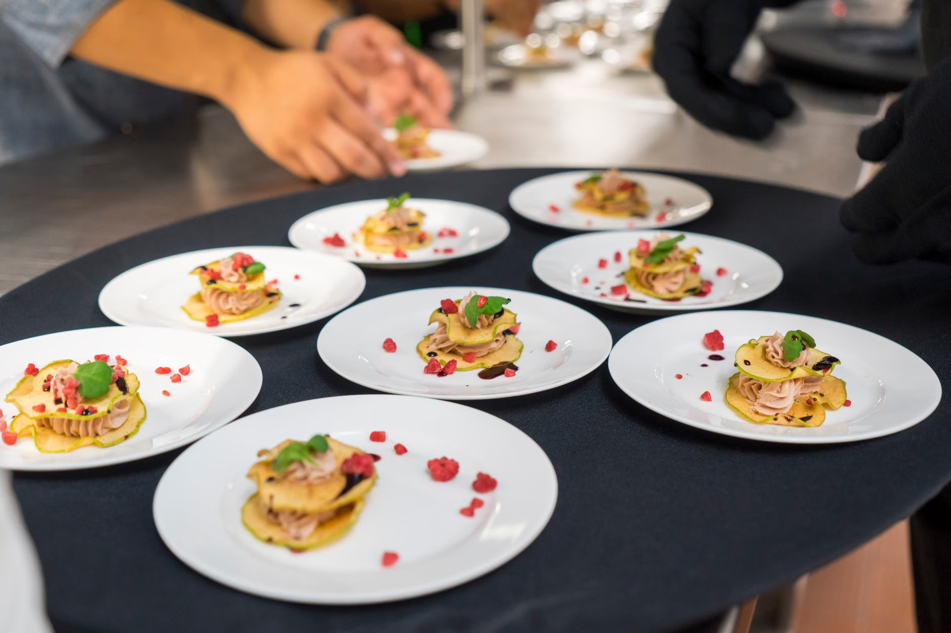 chef serving tasting plate