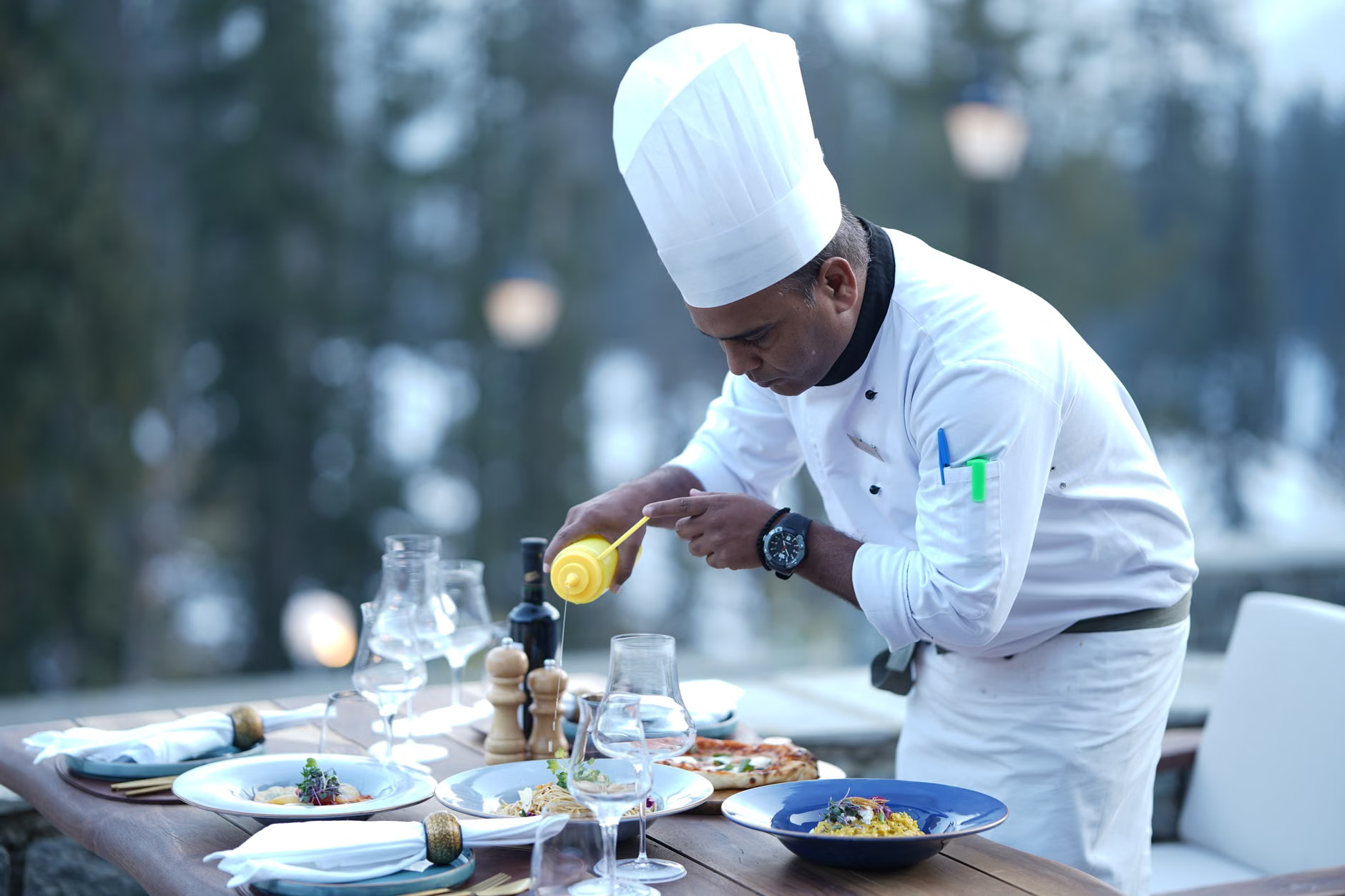 chef plating gourmet dish