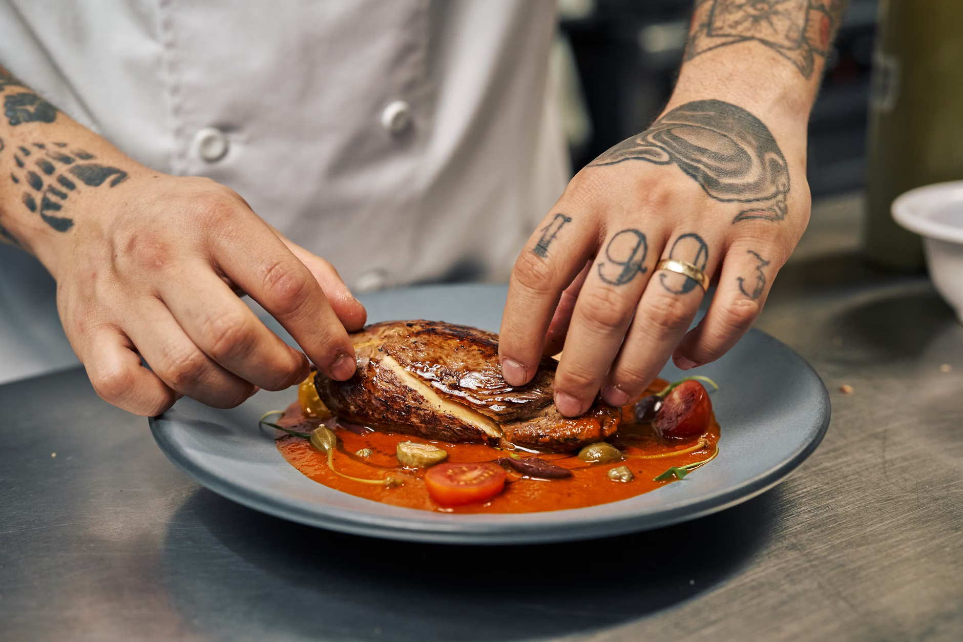 chef plating gourmet dish